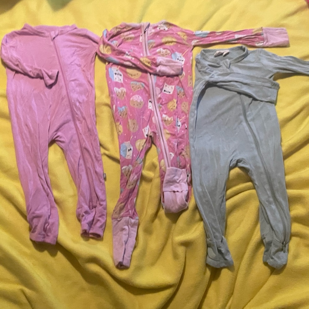 3 sets of bamboo pajamas. Two way zipper on all. 6-12m kyte & little sleeples